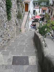 Steps leading down to restaurants in Positano