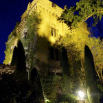 Chateau de Riell castle at night