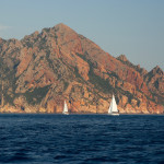 Scandola Nature Preserve sailboats in distance