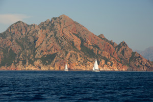 Scandola Nature Preserve sailboats in distance