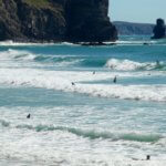 Praia Arrifana surfers waves