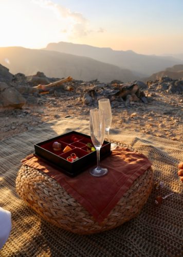Zighy Bay Sabatyn sunset picnic date champagne